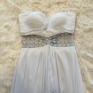 White Strapless Gown with Silver Embellishments